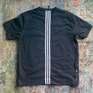 Kith Black Tee with Vertical White Stripes